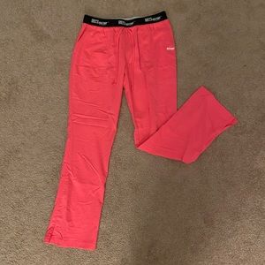 Bright pink scrub pants